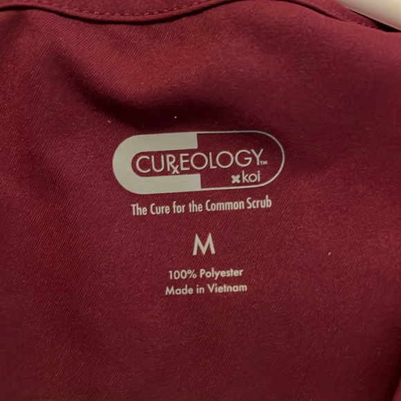 Cureology burgundy scrub top - Picture 2 of 3